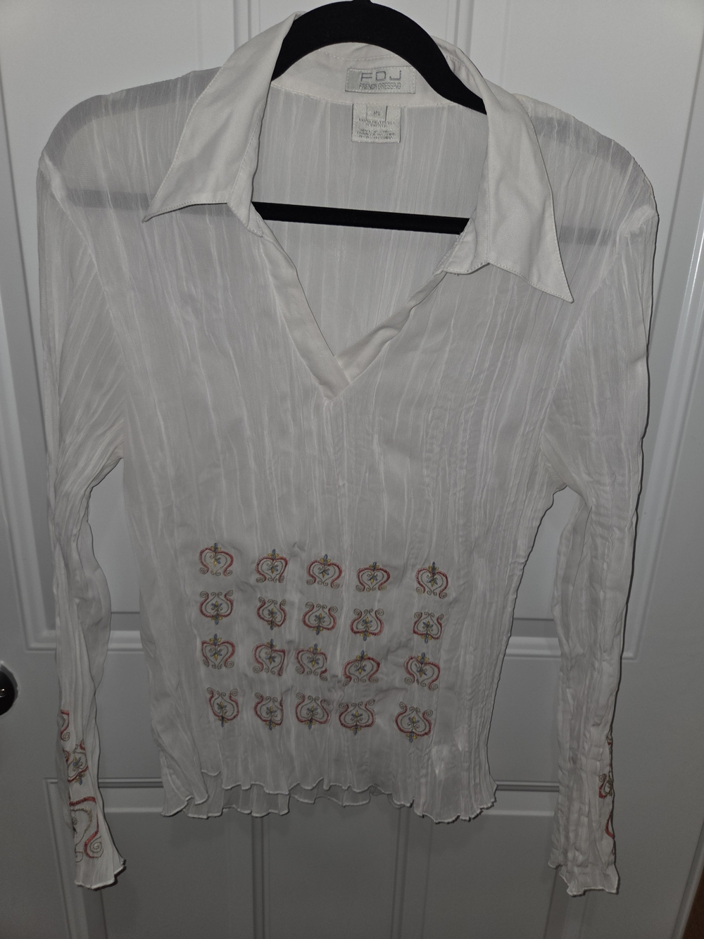 White Long-Sleeve V-Neck Blouse with Embroidered Detail
